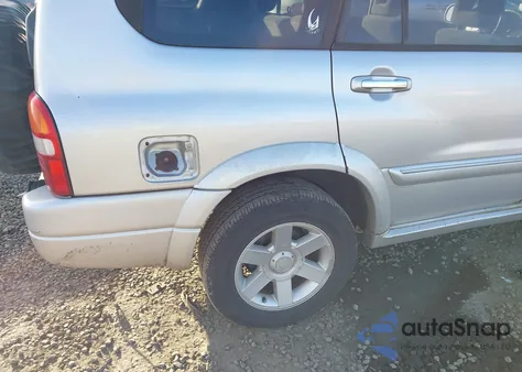 2003 Suzuki Xl-7 Ltd/Touring z USA, uszkodzony, nr VIN JS3TX92V934109805